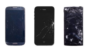 Three phones with broken screens. isolated on white background